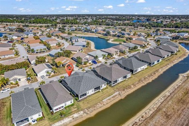 One or more photo(s) has been virtually staged. Better than new on Kings Gate Golf Club in Florida - for sale on GolfHomes.com, golf home, golf lot