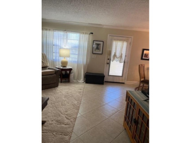 A Pleasure to show a clean Deluxe Model. Enclosed Patio, Enjoy on Kings Point Golf -Flanders Way in Florida - for sale on GolfHomes.com, golf home, golf lot