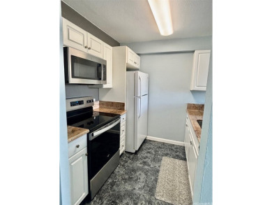 Excellent location, minutes to Pearlridge shopping Center on Pearl Country Club in Hawaii - for sale on GolfHomes.com, golf home, golf lot