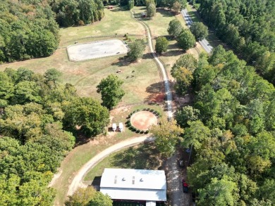 Build your dream home on this double lot 4.3 acre level wooded on The Patriot Golf Club At Grand Harbor in South Carolina - for sale on GolfHomes.com, golf home, golf lot