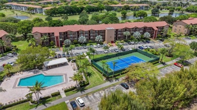 This tastefully remodeled 1/1 condo in Century Village on Flamingo Lakes Country Club in Florida - for sale on GolfHomes.com, golf home, golf lot