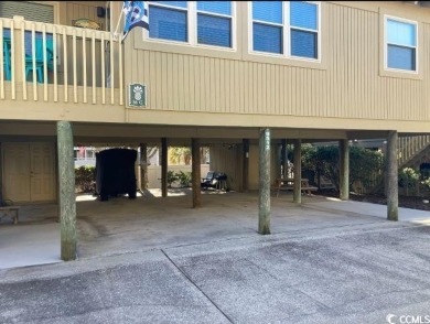 This great 4 bedroom, 3 bath cottage is one block from beach on The Dunes Golf and Beach Club in South Carolina - for sale on GolfHomes.com, golf home, golf lot