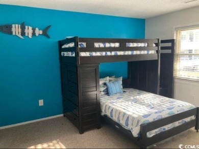 This great 4 bedroom, 3 bath cottage is one block from beach on The Dunes Golf and Beach Club in South Carolina - for sale on GolfHomes.com, golf home, golf lot