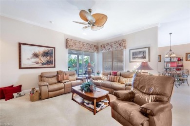 Experience luxury living in this spacious second-floor end unit on Naples Lakes Country Club in Florida - for sale on GolfHomes.com, golf home, golf lot