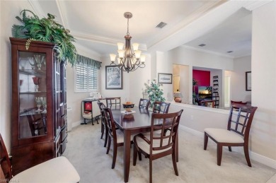 Experience luxury living in this spacious second-floor end unit on Naples Lakes Country Club in Florida - for sale on GolfHomes.com, golf home, golf lot