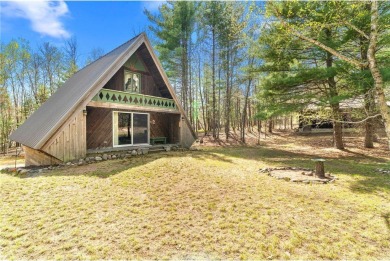 Impressively updated and meticulously maintained A-frame on Voyager Village Country Club - Voyager in Wisconsin - for sale on GolfHomes.com, golf home, golf lot