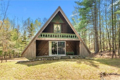 Impressively updated and meticulously maintained A-frame on Voyager Village Country Club - Voyager in Wisconsin - for sale on GolfHomes.com, golf home, golf lot