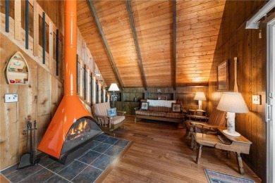 Impressively updated and meticulously maintained A-frame on Voyager Village Country Club - Voyager in Wisconsin - for sale on GolfHomes.com, golf home, golf lot