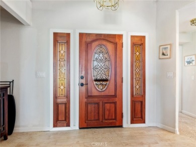 Welcome to 14996 Shady Elm, a warm and inviting 3-bedroom on Silver Lakes Golf Course in California - for sale on GolfHomes.com, golf home, golf lot