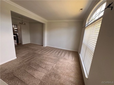 Welcome to this spacious and well-appointed townhome in the on The Tradition Golf Club At The Crossings in Virginia - for sale on GolfHomes.com, golf home, golf lot