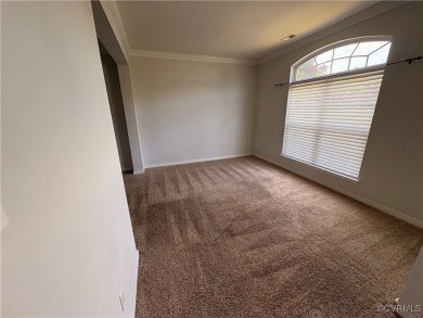Welcome to this spacious and well-appointed townhome in the on The Tradition Golf Club At The Crossings in Virginia - for sale on GolfHomes.com, golf home, golf lot