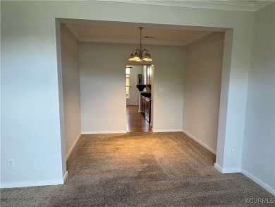 Welcome to this spacious and well-appointed townhome in the on The Tradition Golf Club At The Crossings in Virginia - for sale on GolfHomes.com, golf home, golf lot