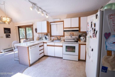 Cozy up in style in this beautifully maintained Poconos chalet on The Hideout Golf in Pennsylvania - for sale on GolfHomes.com, golf home, golf lot