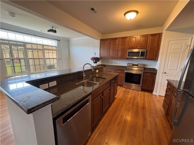 Welcome to this spacious and well-appointed townhome in the on The Tradition Golf Club At The Crossings in Virginia - for sale on GolfHomes.com, golf home, golf lot