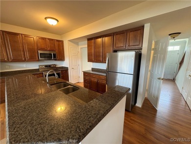 Welcome to this spacious and well-appointed townhome in the on The Tradition Golf Club At The Crossings in Virginia - for sale on GolfHomes.com, golf home, golf lot