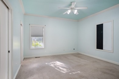 Custom European-style stucco and stone home in a 18-hole golf on Madisonville Golf and Country Club in Kentucky - for sale on GolfHomes.com, golf home, golf lot