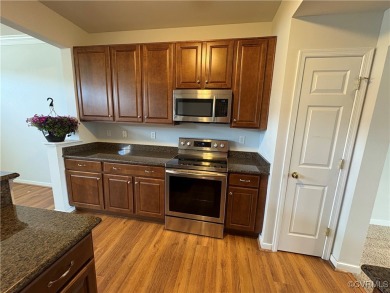 Welcome to this spacious and well-appointed townhome in the on The Tradition Golf Club At The Crossings in Virginia - for sale on GolfHomes.com, golf home, golf lot