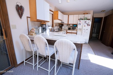 Cozy up in style in this beautifully maintained Poconos chalet on The Hideout Golf in Pennsylvania - for sale on GolfHomes.com, golf home, golf lot