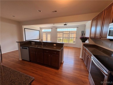 Welcome to this spacious and well-appointed townhome in the on The Tradition Golf Club At The Crossings in Virginia - for sale on GolfHomes.com, golf home, golf lot