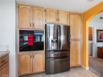 Welcome to 14996 Shady Elm, a warm and inviting 3-bedroom on Silver Lakes Golf Course in California - for sale on GolfHomes.com, golf home, golf lot