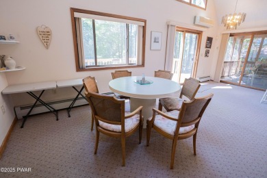 Cozy up in style in this beautifully maintained Poconos chalet on The Hideout Golf in Pennsylvania - for sale on GolfHomes.com, golf home, golf lot