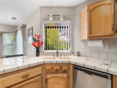 Welcome to 14996 Shady Elm, a warm and inviting 3-bedroom on Silver Lakes Golf Course in California - for sale on GolfHomes.com, golf home, golf lot
