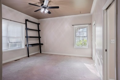 Custom European-style stucco and stone home in a 18-hole golf on Madisonville Golf and Country Club in Kentucky - for sale on GolfHomes.com, golf home, golf lot