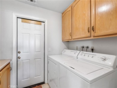 Welcome to 14996 Shady Elm, a warm and inviting 3-bedroom on Silver Lakes Golf Course in California - for sale on GolfHomes.com, golf home, golf lot