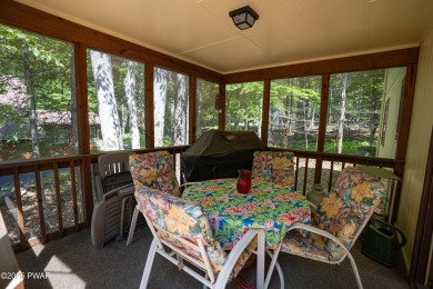 Cozy up in style in this beautifully maintained Poconos chalet on The Hideout Golf in Pennsylvania - for sale on GolfHomes.com, golf home, golf lot