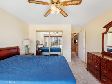 Welcome to 14996 Shady Elm, a warm and inviting 3-bedroom on Silver Lakes Golf Course in California - for sale on GolfHomes.com, golf home, golf lot
