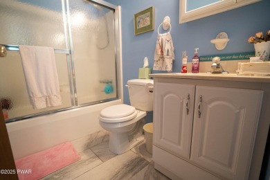 Cozy up in style in this beautifully maintained Poconos chalet on The Hideout Golf in Pennsylvania - for sale on GolfHomes.com, golf home, golf lot