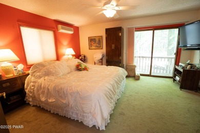 Cozy up in style in this beautifully maintained Poconos chalet on The Hideout Golf in Pennsylvania - for sale on GolfHomes.com, golf home, golf lot