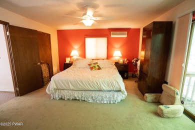 Cozy up in style in this beautifully maintained Poconos chalet on The Hideout Golf in Pennsylvania - for sale on GolfHomes.com, golf home, golf lot