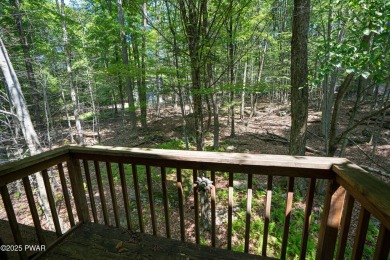 Cozy up in style in this beautifully maintained Poconos chalet on The Hideout Golf in Pennsylvania - for sale on GolfHomes.com, golf home, golf lot
