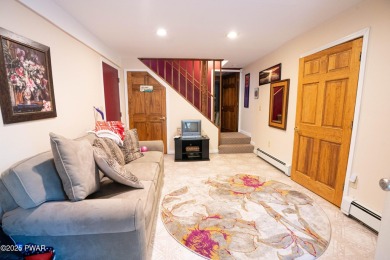 Cozy up in style in this beautifully maintained Poconos chalet on The Hideout Golf in Pennsylvania - for sale on GolfHomes.com, golf home, golf lot