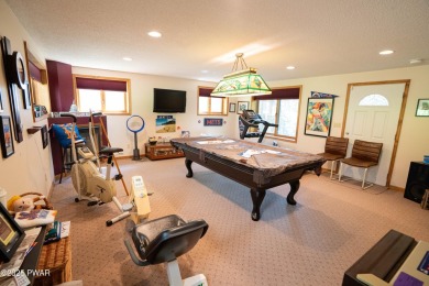 Cozy up in style in this beautifully maintained Poconos chalet on The Hideout Golf in Pennsylvania - for sale on GolfHomes.com, golf home, golf lot