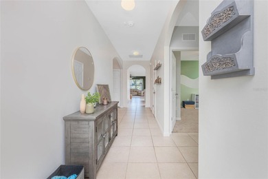 Step into this beautiful, like-new modern 4-bedroom, 2-bath home on Deep Creek Golf Club in Florida - for sale on GolfHomes.com, golf home, golf lot