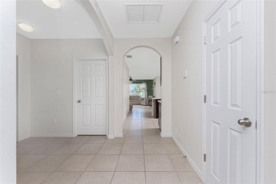 Step into this beautiful, like-new modern 4-bedroom, 2-bath home on Deep Creek Golf Club in Florida - for sale on GolfHomes.com, golf home, golf lot