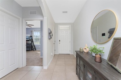 Step into this beautiful, like-new modern 4-bedroom, 2-bath home on Deep Creek Golf Club in Florida - for sale on GolfHomes.com, golf home, golf lot