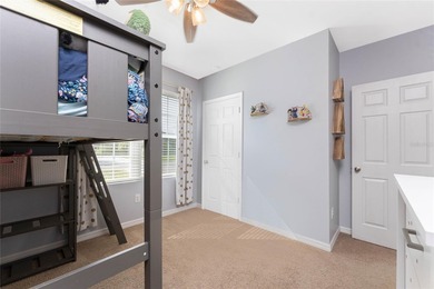 Step into this beautiful, like-new modern 4-bedroom, 2-bath home on Deep Creek Golf Club in Florida - for sale on GolfHomes.com, golf home, golf lot