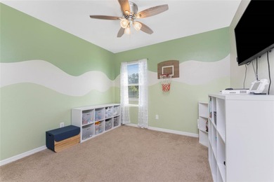 Step into this beautiful, like-new modern 4-bedroom, 2-bath home on Deep Creek Golf Club in Florida - for sale on GolfHomes.com, golf home, golf lot