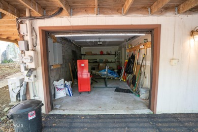 Cozy up in style in this beautifully maintained Poconos chalet on The Hideout Golf in Pennsylvania - for sale on GolfHomes.com, golf home, golf lot