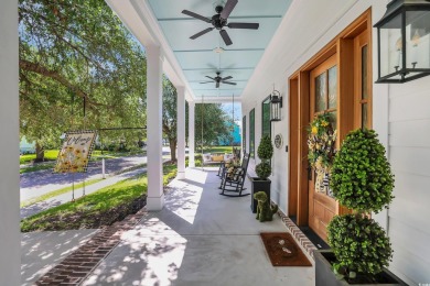 Gorgeous, custom-built home with 4 bedrooms, 3  1/2  bathrooms on Tidewater Golf Club and Plantation in South Carolina - for sale on GolfHomes.com, golf home, golf lot