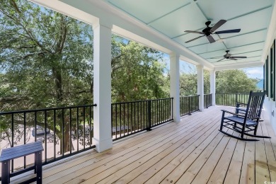 Gorgeous, custom-built home with 4 bedrooms, 3  1/2  bathrooms on Tidewater Golf Club and Plantation in South Carolina - for sale on GolfHomes.com, golf home, golf lot