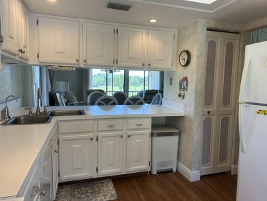 Welcome to luxury living at Riverbend Country Club! This on Riverbend Golf Club in Florida - for sale on GolfHomes.com, golf home, golf lot