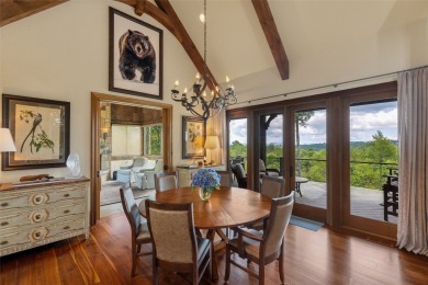 This custom home is noteworthy for its elegant stone facade on Cullasaja Club in North Carolina - for sale on GolfHomes.com, golf home, golf lot