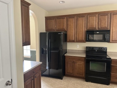 ALL BRICK HOME. 3BR 2BA WITH ALL NEW LAMINATE WOOD FLOORING IN on Barefoot Resort and Golf Club  in South Carolina - for sale on GolfHomes.com, golf home, golf lot