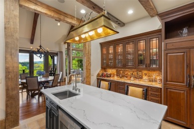 This custom home is noteworthy for its elegant stone facade on Cullasaja Club in North Carolina - for sale on GolfHomes.com, golf home, golf lot