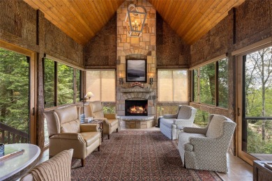 This custom home is noteworthy for its elegant stone facade on Cullasaja Club in North Carolina - for sale on GolfHomes.com, golf home, golf lot