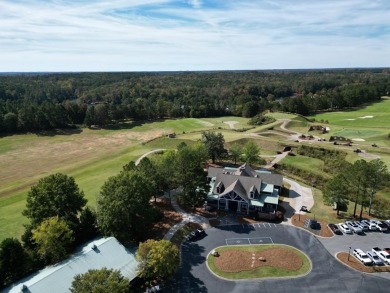 Build your dream home on this level wooded home site located at on The Patriot Golf Club At Grand Harbor in South Carolina - for sale on GolfHomes.com, golf home, golf lot